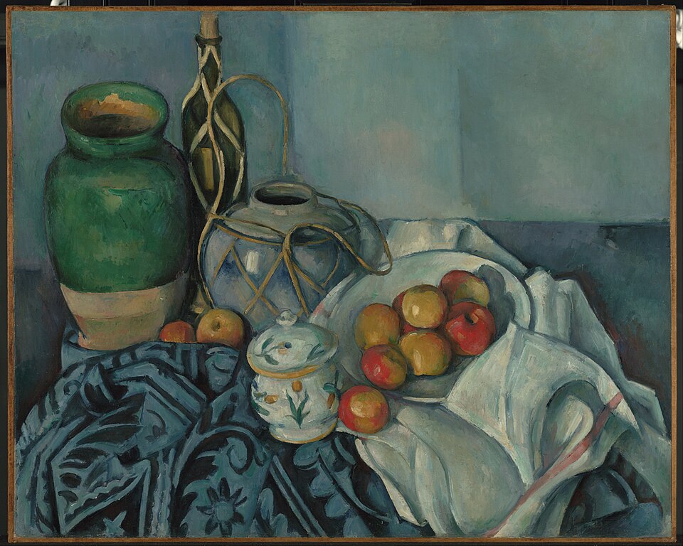 Bodegón de Paul Cézanne con manzanas, jarra y mantel sobre una mesa